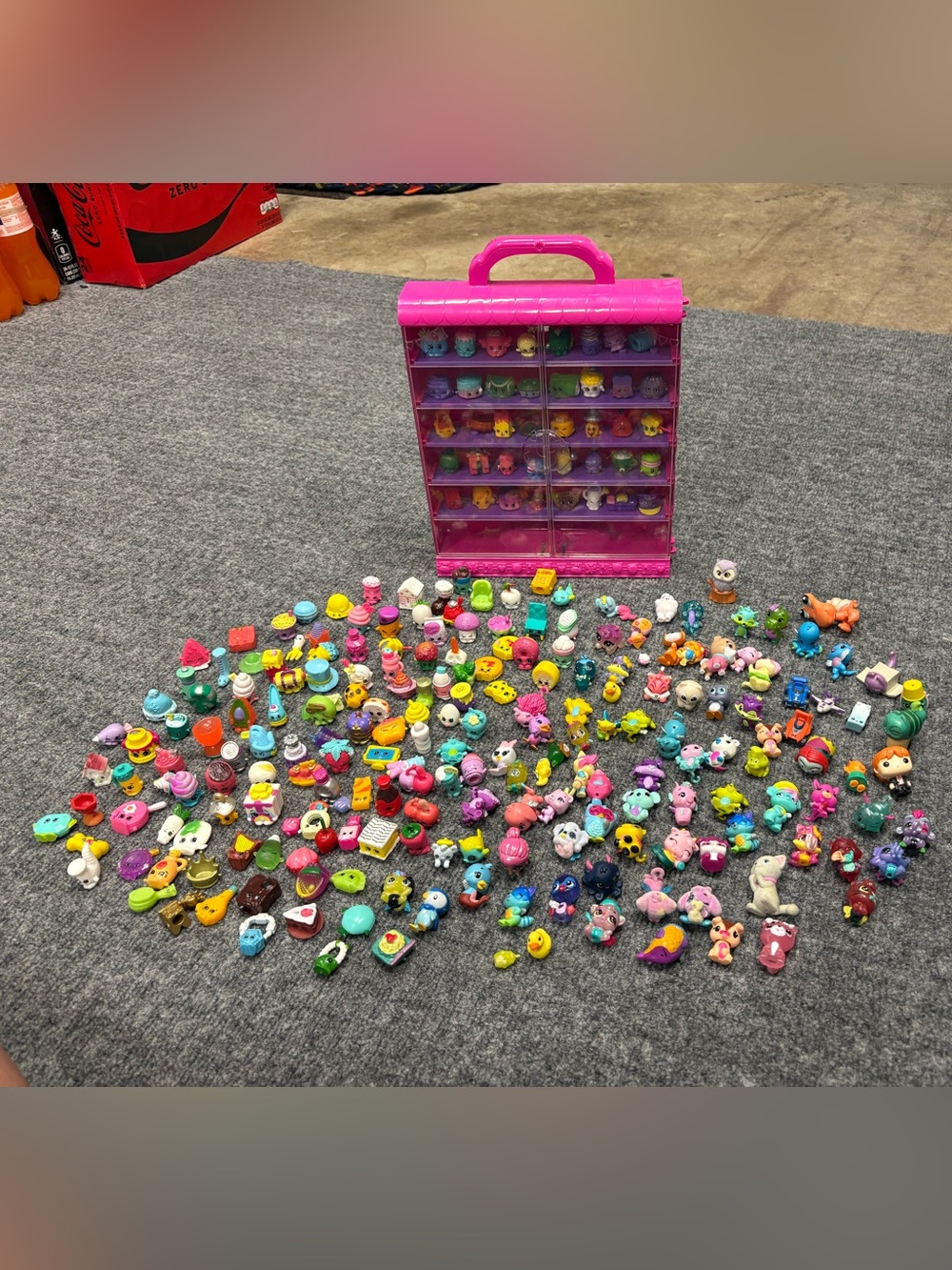 200+ Shopkins, Hatchimals, and others plus Display Case